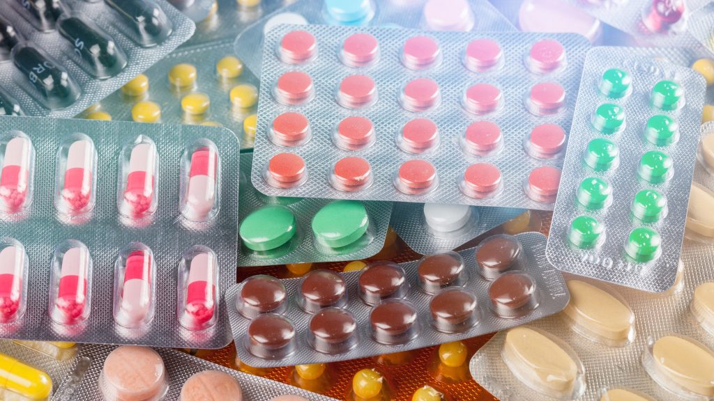 defective-drugs Defective drug attorney reviewing case documents with a client injured by a prescription medication in Charlotte or Kinston, NC.
