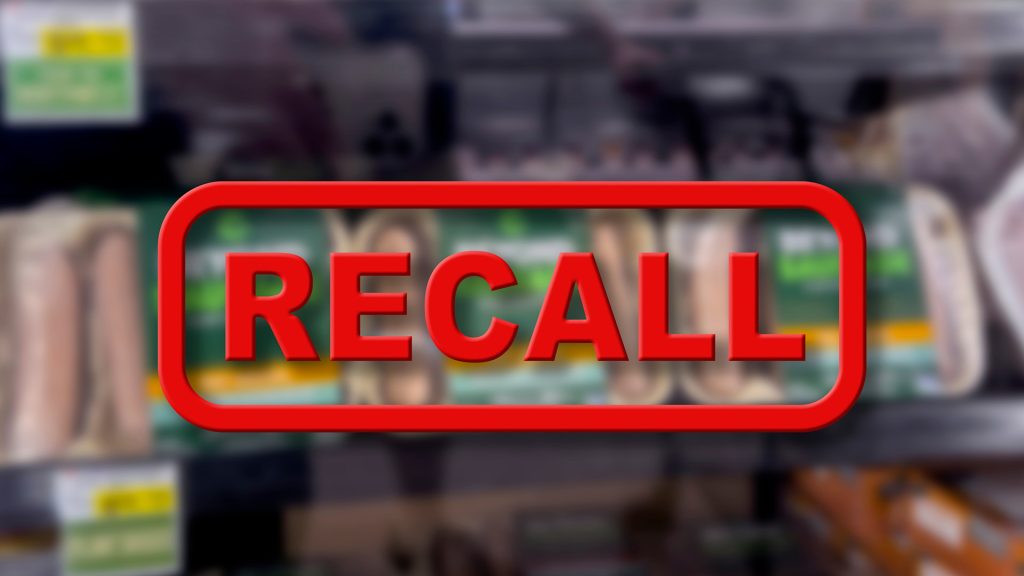 defective-products Product liability attorney reviewing a defective product case with an injured client in Charlotte or Kinston, NC, examining evidence and consumer safety documents.