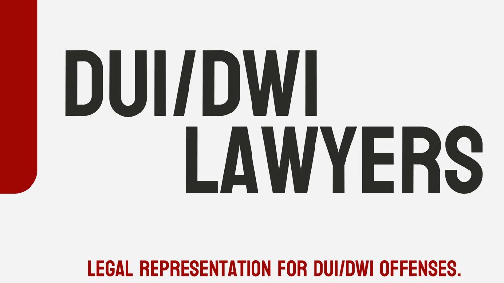 dwi-lawyer-in-kinston-nc DWI defense attorney meeting with a client in Charlotte or Kinston, NC, reviewing police reports and court documents after a drunk driving arrest.