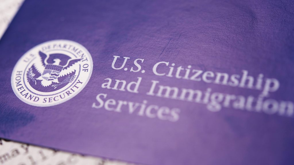 us-citizenship-lawyer-in-kinston-nc Immigration lawyer assisting a green card holder with U.S. naturalization paperwork in Charlotte or Kinston, NC, preparing for citizenship application and interview.