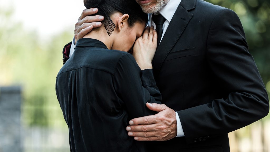 wrongful-death Wrongful death attorney meeting with grieving family members in Charlotte or Kinston, NC, offering legal guidance and support after a tragic loss.
